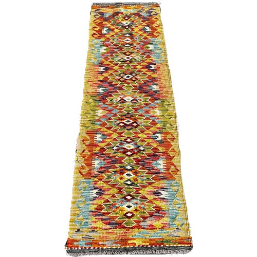 1657 - A Chobi kilim runner with a central row of stepped diamonds, 202cm x 60cm approximately