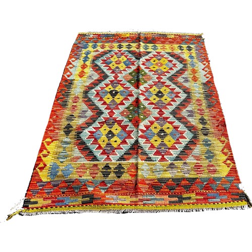 1667 - A Chobi kilim with an all over multicoloured diamond pattern, 159cm x 101cm approximately