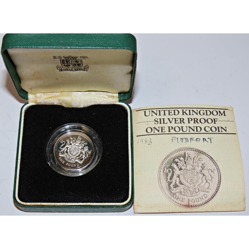 404 - Elizabeth II, Royal Mint cased commemorative silver coins to include 1983 Silver Proof £1 Coin, 1989... 