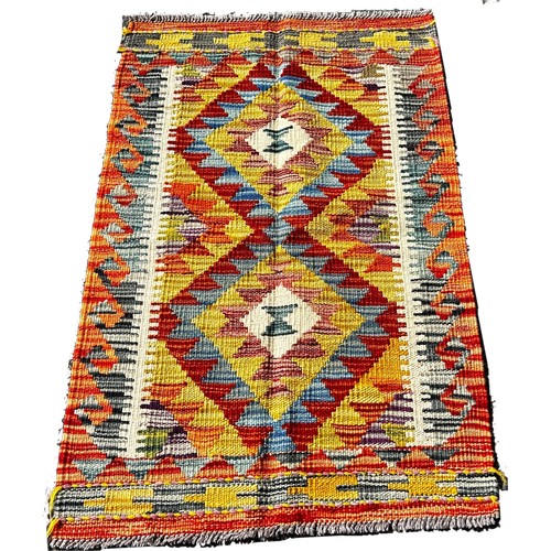 1675 - A Chobi kilim mat with a double diamond panel, 86cm x 57cm