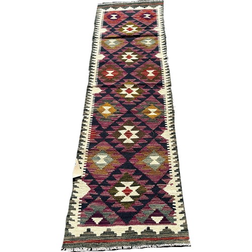 1684 - A Maimana kilim runner with alternating stepped diamonds on a purple ground, 200cm x 58cm approximat... 