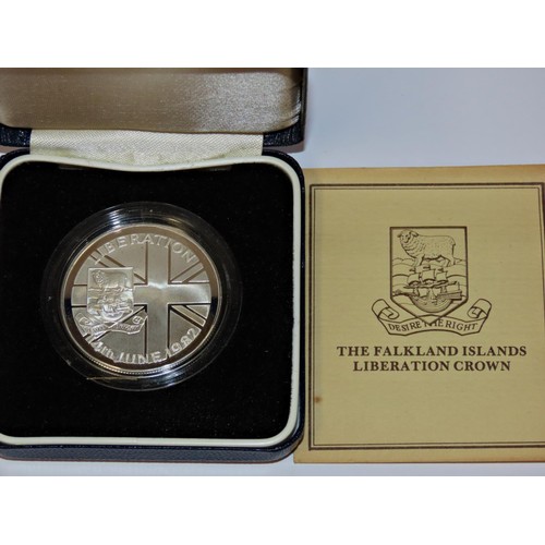 414 - Royal Mint and other Falkland Island cased commemorative silver coins to include Royal Mint 100th An... 