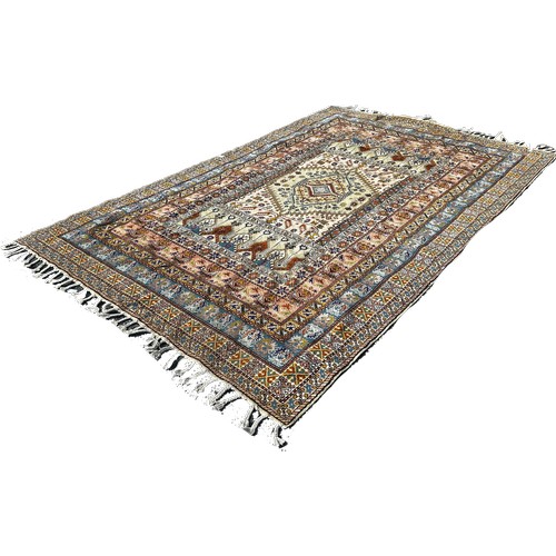 1679 - A Persian rug with a rectangular panel interspersed with stylised flowers, 300cm x 200cm approximate... 