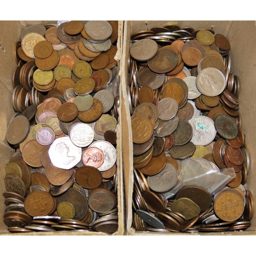 450 - Two small cardboard boxes containing a mixed collection of circulated British and world coins.