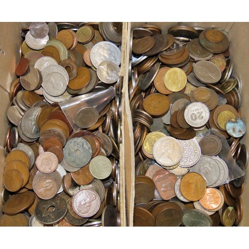 450 - Two small cardboard boxes containing a mixed collection of circulated British and world coins.