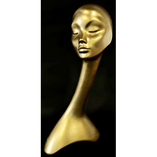 585 - An Art Deco Golden shop head and shoulder mannequin, with an imaginative elegant long neck, 62cm hig... 