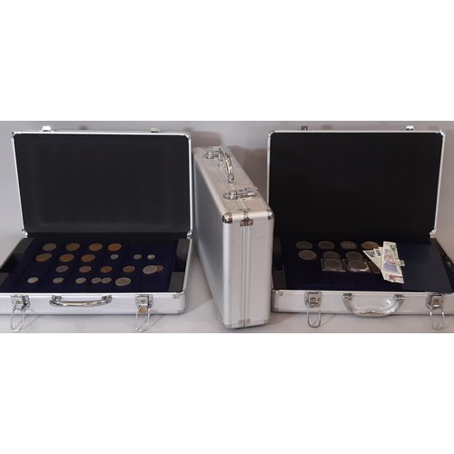 460 - Three modern coin collecting cases containing mixed British and world coins to include commemorative... 