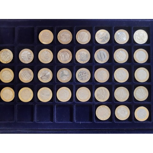 460 - Three modern coin collecting cases containing mixed British and world coins to include commemorative... 