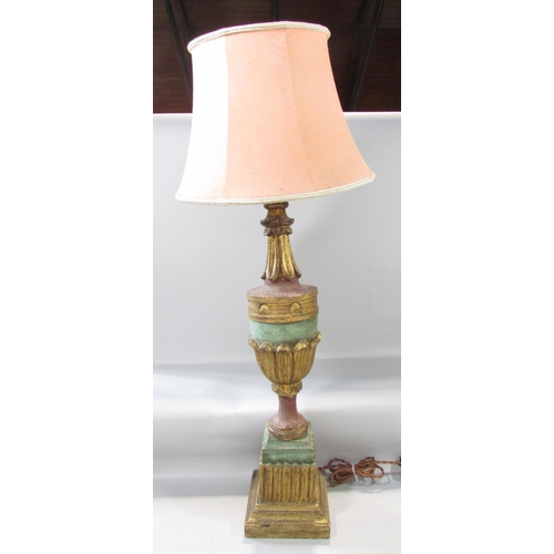 724 - A carved wood table lamp of an urn on a plinth win a painted finish with gold highlights, with a sha... 