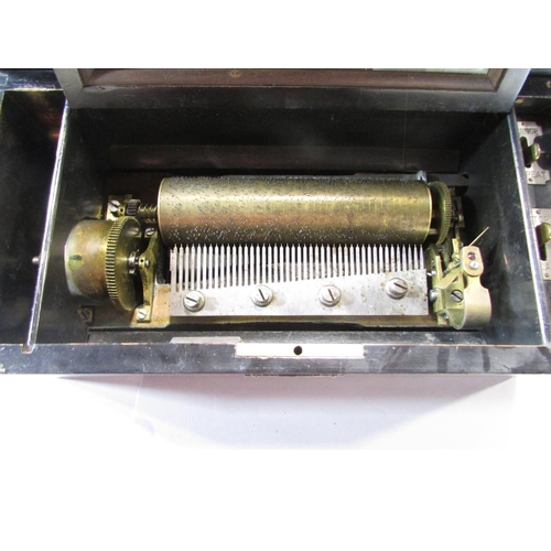 569 - A 19th century coromandel single cylinder music box with a repeat and change lever 34cm x 17.5cm (al... 