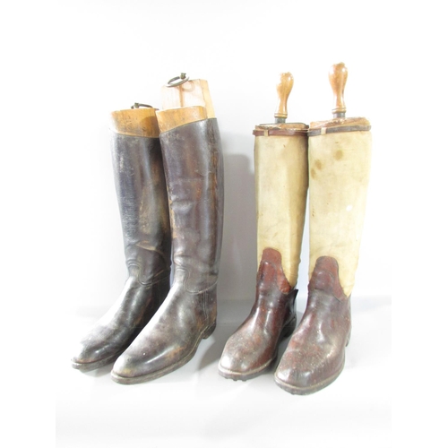 573 - A vintage pair of Gentleman’s brown leather riding boots, size 9 or 10 with wooden trees, together w... 