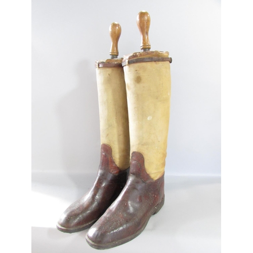 573 - A vintage pair of Gentleman’s brown leather riding boots, size 9 or 10 with wooden trees, together w... 