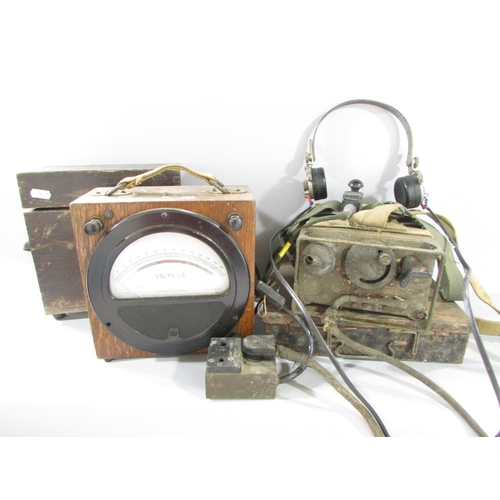 580 - A collection of WWII Equipment, including a ruck sack, webbing, helmet, water bottles, a field radio... 