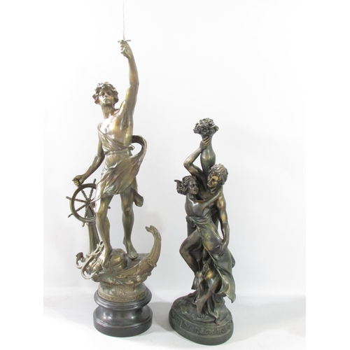 582 - A spelter figure of a victorious sailor, sword in hand, standing on elements of a ship raised on a s... 