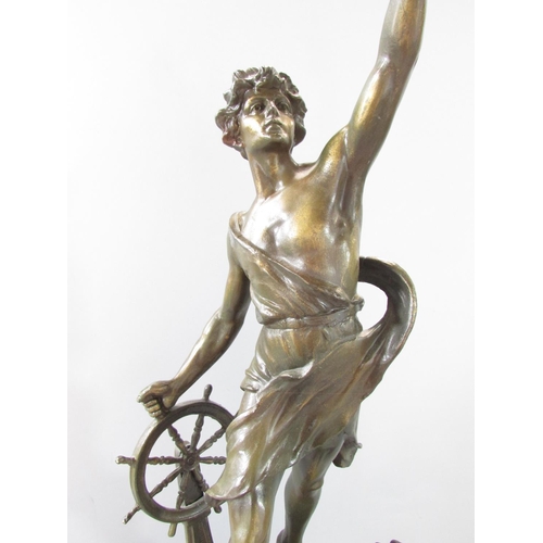 582 - A spelter figure of a victorious sailor, sword in hand, standing on elements of a ship raised on a s... 