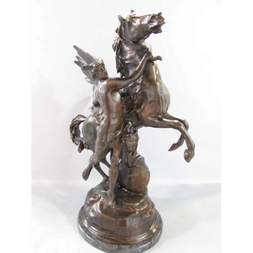 583 - A bronze study of Perseus, with a rearing Pegasus, holding Medusa’s severed head, raised on a marble... 