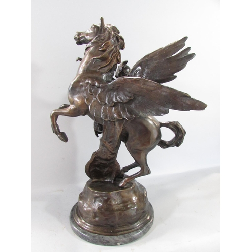 583 - A bronze study of Perseus, with a rearing Pegasus, holding Medusa’s severed head, raised on a marble... 