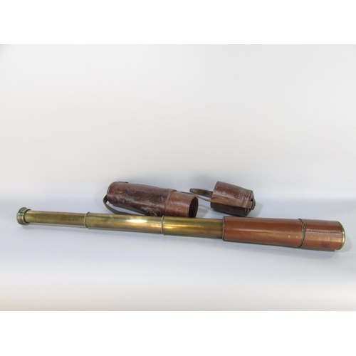 588 - An H C Ryland & Son military issue WW1 military leather and brass three drawer telescope in it’s ori... 