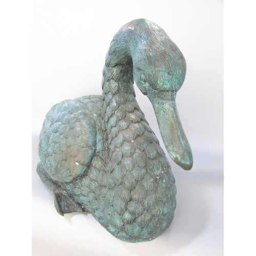 591 - A bronze study of a goose, life size, with verdigris finish, 50cm wide.