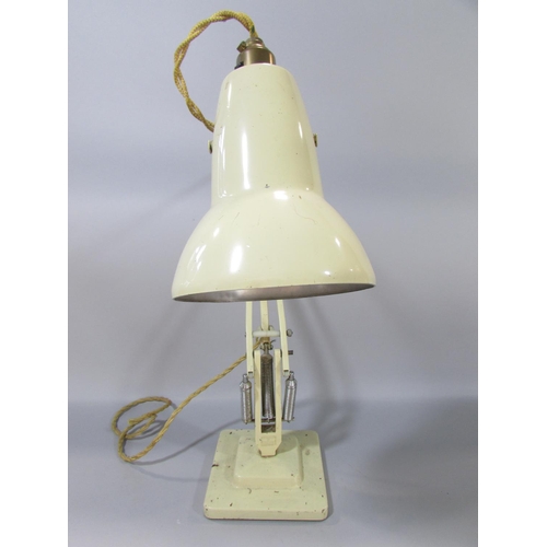 595 - Three Herbert Terry and Sons Ltd Redditch cream finished square based Anglepoise lamps and a red Ang... 