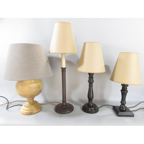 599 - Three Pooky wooden table lamps, a Daisy, a Fred and a Venus model, and a fourth similar candlestick ... 