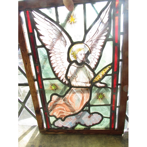 600 - A 19th century stained glass panel of an angel in a wooden frame. 48cm x 34cm including frame. (As F... 