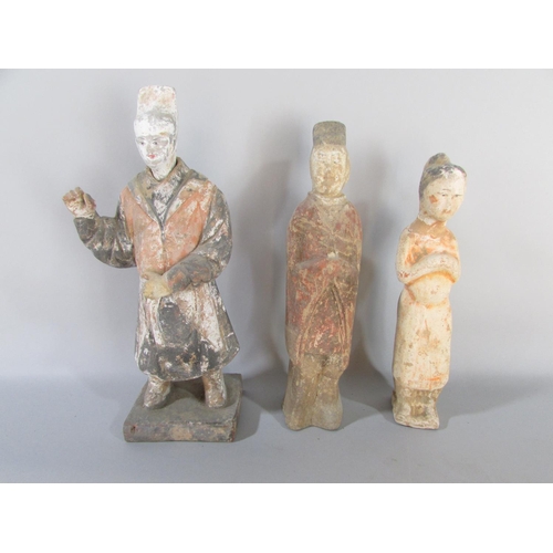 603 - A group of six Chinese items with one other to include : three attendants, Tang Dynasty or later, an... 