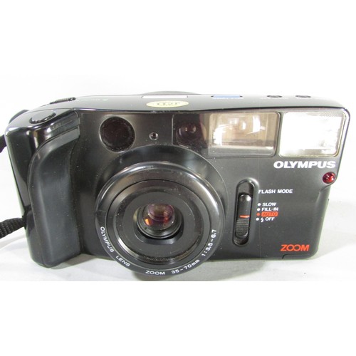 611 - A Canon EOS 5000 camera, an Olympus Zoom camera, a further lens and other photographic equipment hou... 