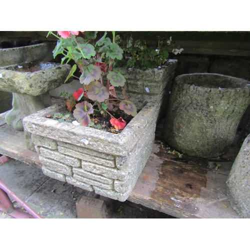 1002 - Nine weathered cast composition stone garden planters and two small bird baths of varying size and d... 