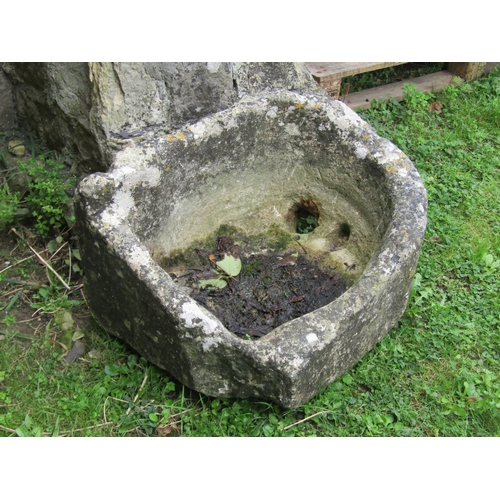 1067 - A well weathered natural stone rectangular D-end trough / planter with two drainage holes, 36cm high... 