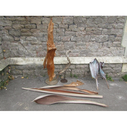 1098 - A drift wood sculpture mounted on a circular platform base, 124 cm high together with a selection of... 