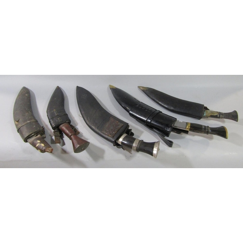 707 - Five Kukri in leather and other scabbards