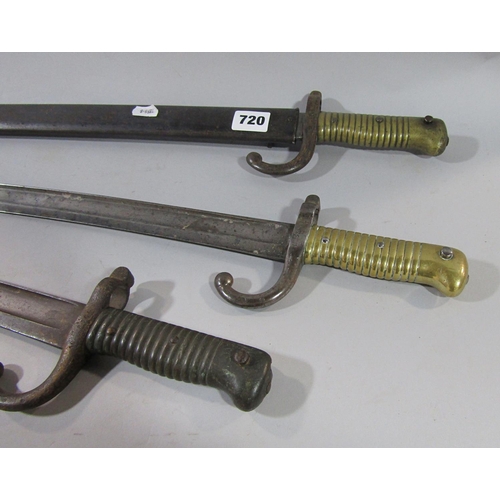 720 - Three dated French Chassepot bayonets, one with scabbard dated 1870, 1874, 1874