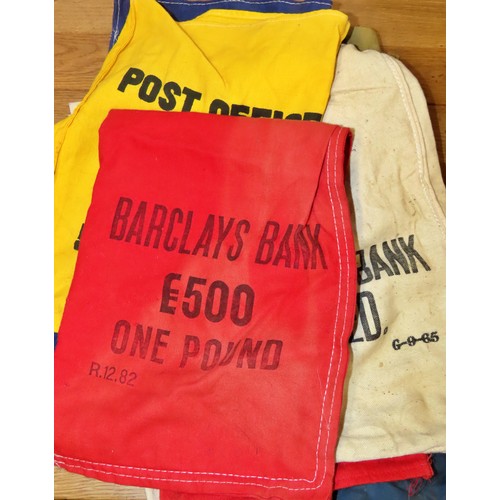 433 - A mixed group of old British banking linen cash bags, Lloyds and others.