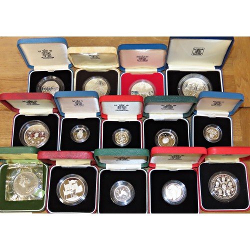 432 - A collection of 39 individually boxed silver proof coins, to include Royal Mint proof Crowns, £2, £1... 