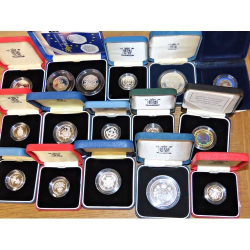 432 - A collection of 39 individually boxed silver proof coins, to include Royal Mint proof Crowns, £2, £1... 