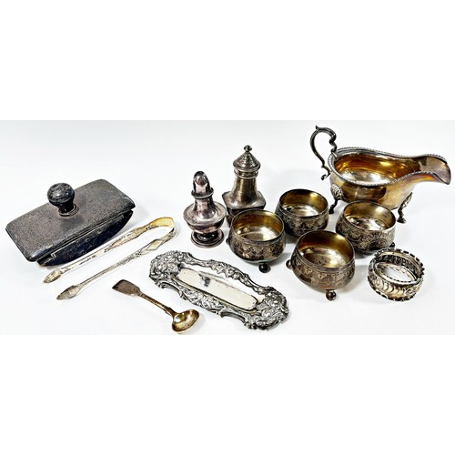 267 - A mixed selection of silverware including four salt cauldrons, salt and pepper pots, sauce boat, sug... 