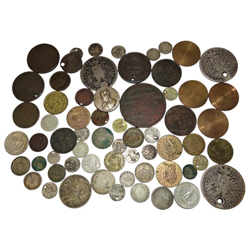 332 - An interesting collection of world coins, tokens, medals and curios, to include three ‘Mother Theres... 