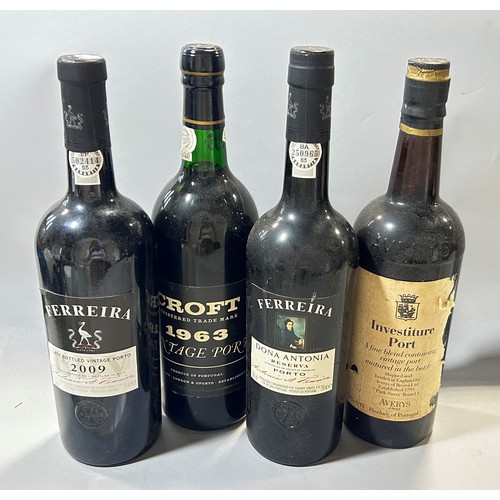 699 - Four bottles of Port by various makers, an Investiture Port, two Ferreira Ports and a Croft Port