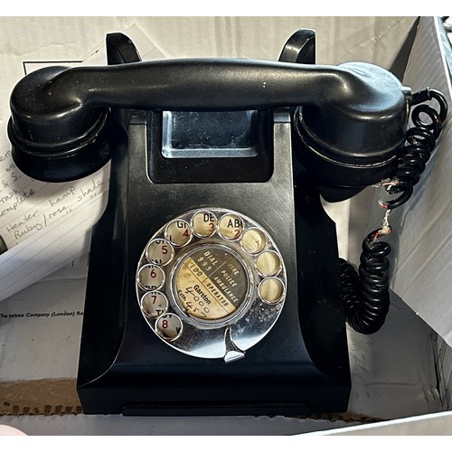 688 - A Vintage black Bakelite rotary telephone and a vintage Monitor No 26 blow torch.