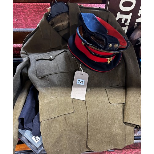 726 - Two Royal Artillery uniforms a dress uniform and a khaki parade ground uniform, both with matching c... 