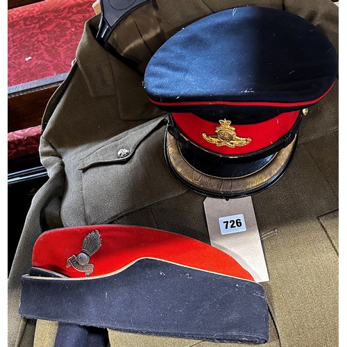 726 - Two Royal Artillery uniforms a dress uniform and a khaki parade ground uniform, both with matching c... 