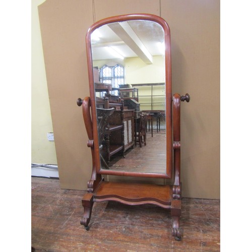 1613A - A 19th century mahogany cheval mirror on platform base, 163cm high x 95cm wide x 55cm deep