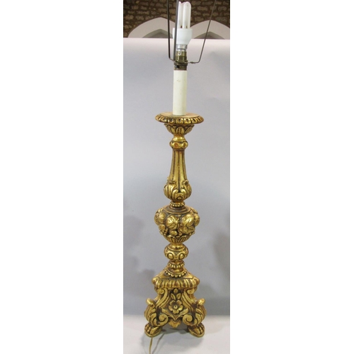 642 - An ecclesiastical gilt candlestick table lamp