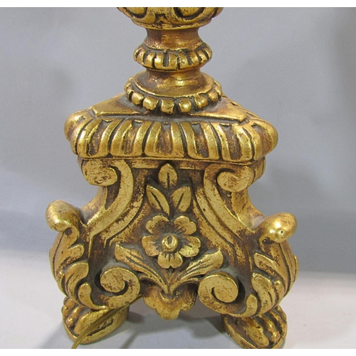 642 - An ecclesiastical gilt candlestick table lamp