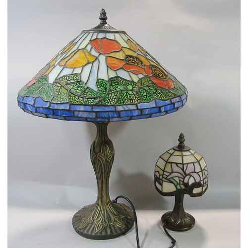 695 - A Tiffany style leaded glass table lamp and a smaller version