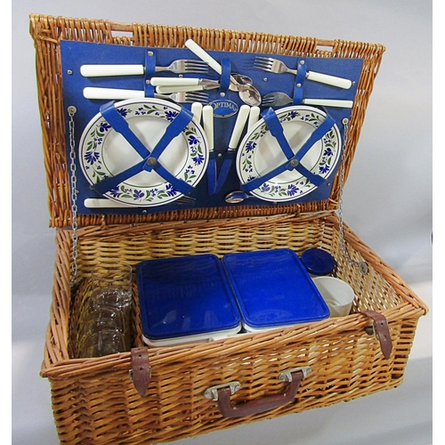 729 - An Optima wicker picnic hamper with Churchill crockery with a floral border, tumblers, cutlery, sand... 