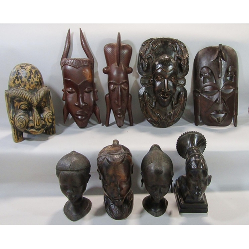 737 - Twelve various African hardwood carvings of head, bust, and masks.