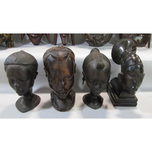 737 - Twelve various African hardwood carvings of head, bust, and masks.