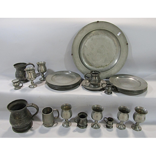 753 - A quantity of 19th century pewter ware, plates, tankards, a charger ets